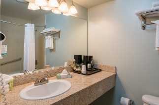 Morro Shores Inn Guest Rooms - Granite sink countertop and coffee maker